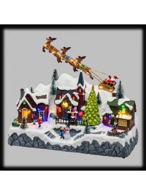 Villaggio 34 x h 28 cm con slitta, pattinatori in movimento e musica natalizia