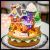 Villaggio di Natale|Ginger bread house con personaggi in movimento, h 21 cm