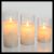 Set 3 Candele Ø 7,5 cm in cera con vetro, effetto fiamma, led bianco classic a batterie